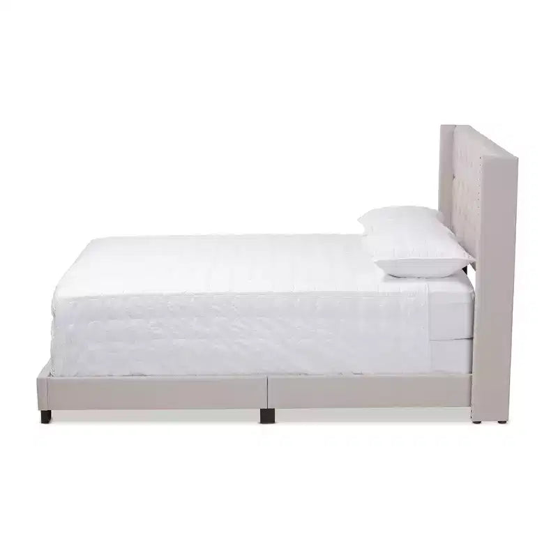 Letto imbottito King Size con testiera capitonné ad ali