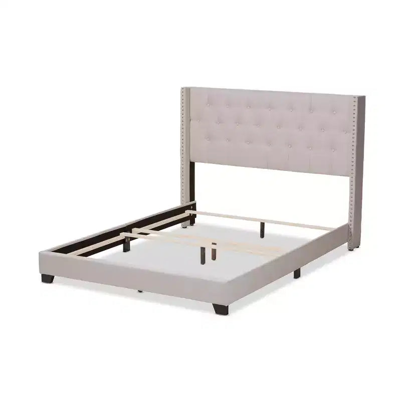 Letto imbottito King Size con testiera capitonné ad ali