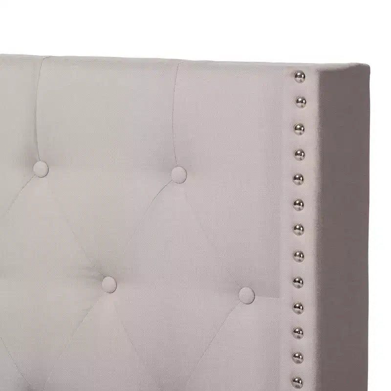 Letto imbottito King Size con testiera capitonné ad ali