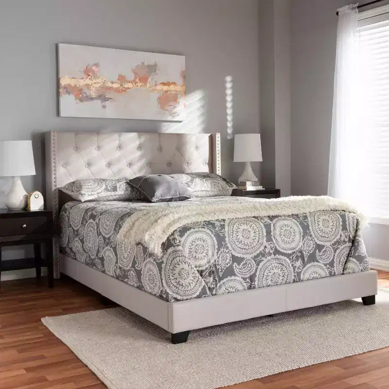Letto imbottito King Size con testiera capitonné ad ali