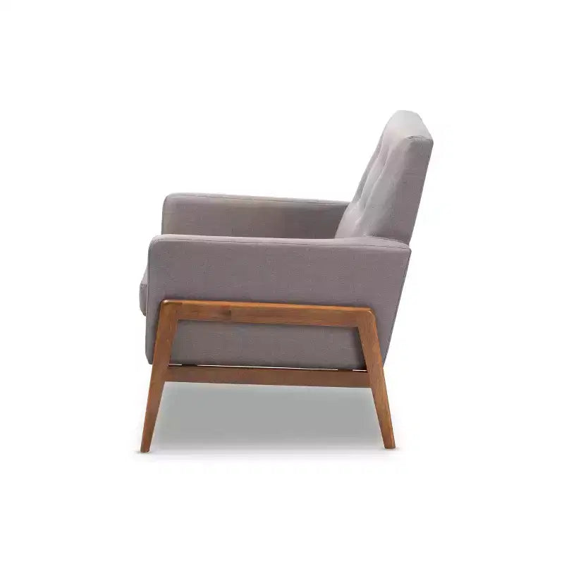 Poltrona imbottita in tessuto e legno di noce